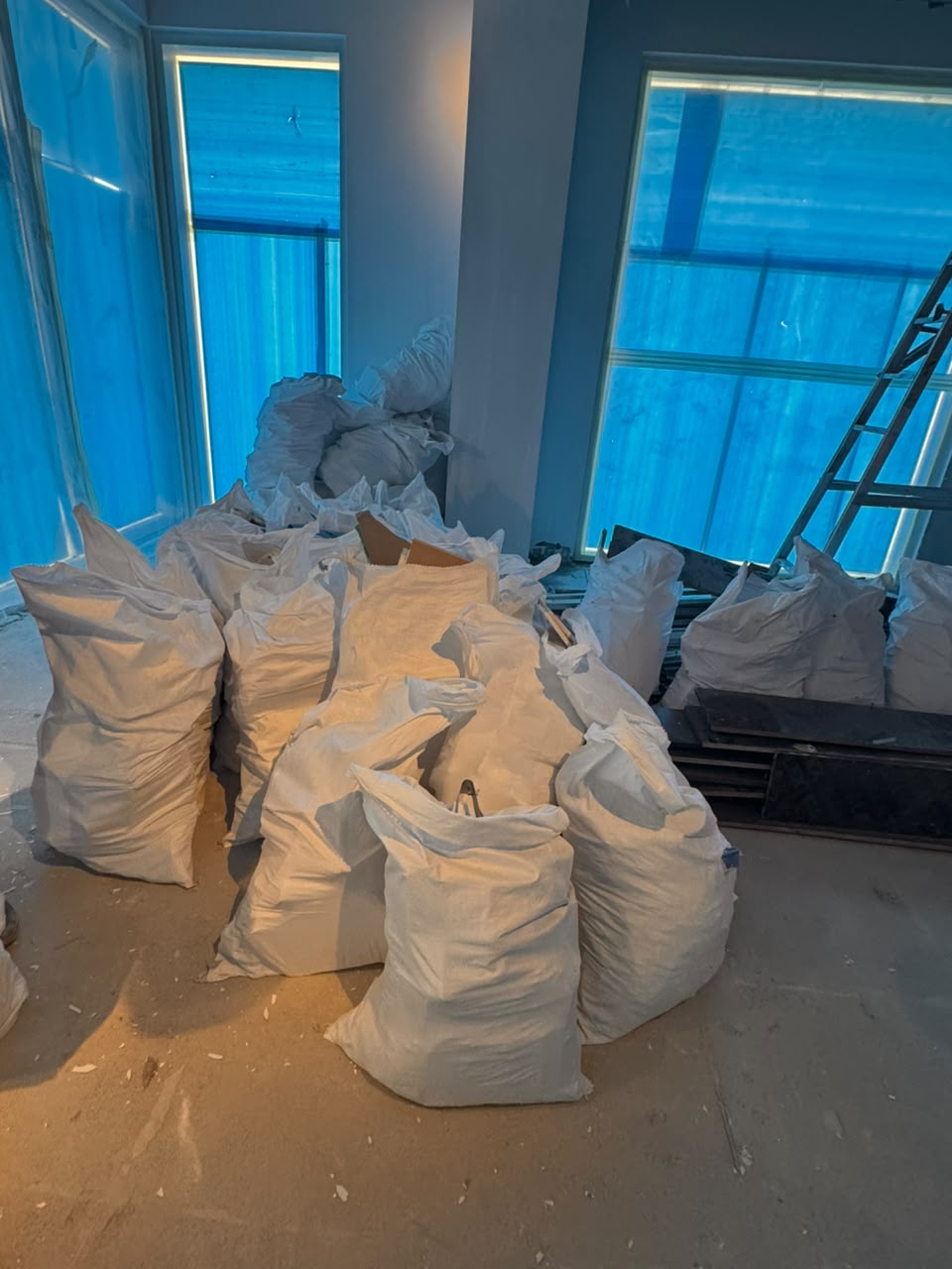 Collected waste bags ready for pickup